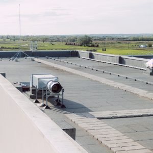 walkable terrace on the roof of the industrial hall is coated wi